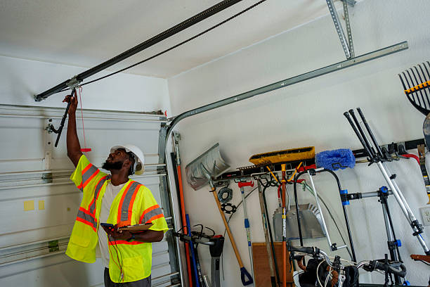 Professional Garage Door Panel Replacement technician working in Hamilton County County, IA